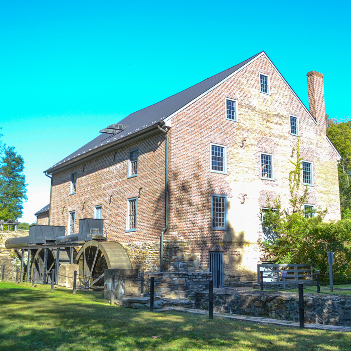 aldie mill historical site with its twin water wheels